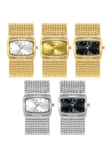 Detailed view of women crystal watch, luxury beaded metal strap, elegant rectangular dial.