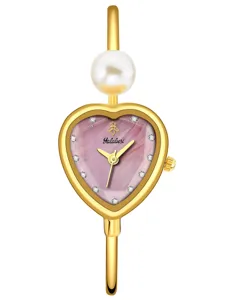 Yalalusi heart dial pearl bangle watch, elegant gold ladies wristwatch detail view.