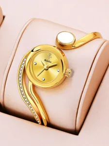 Yalalusi luxury gold bracelet watch for women, elegant curved crystal design detailed view.