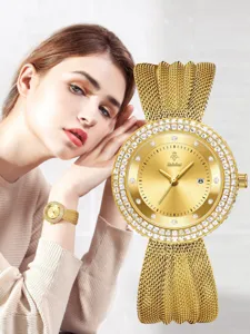 Luxury gold rhinestone quartz women watch detail view, elegant metal mesh strap jewelry.