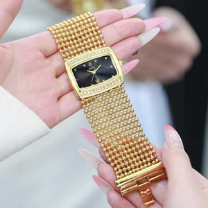 Luxurious gold-tone women watch with beaded strap and rhinestone rectangular dial main view.