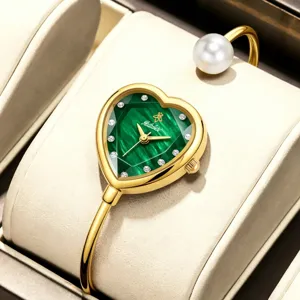 Luxury heart-shaped green dial pearl bangle watch for women, elegant quartz wrist watch.