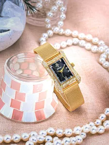 Elegant rectangular women quartz watch featuring sparkling rhinestones and luxury gold mesh strap.