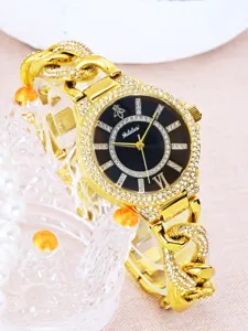 Reloj de cuarzo dorado con diamantes de imitación y correa de cadena negra detalle elegante