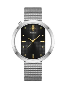 Stylish hollow quartz watch for women with silver mesh strap and unique dial design.