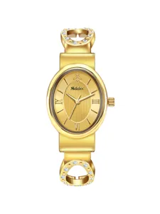 Gold tone oval dial women quartz watch with embellished bracelet link details detail shot