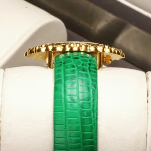 Luxury women jewelry watch with green leather strap elegant emerald design for daily wear.