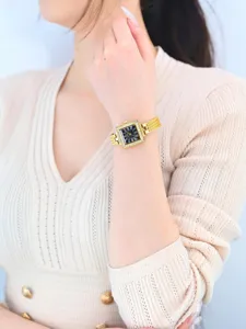 Elegant women square watch with black dial and gold mesh strap for daily casual wear