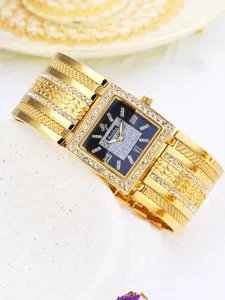 Luxus goldene quadratische Damen Quarz-Armbanduhr mit glänzenden Strasssteinen und Armband.