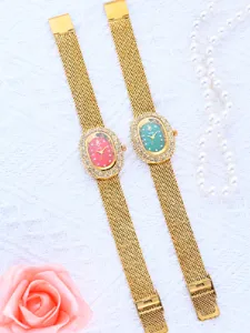 Reloj de lujo para mujer con elegante esfera ovalada y correa de malla dorada de moda.