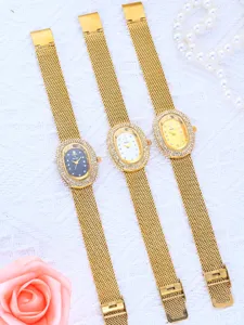Reloj de cuarzo elegante para mujer con diamantes de imitación y correa dorada.
