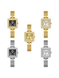 Exquisite square rhinestone watch detail, luxury retro design with metallic mesh strap.