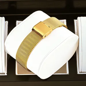 Gold mesh band women quartz watch with sleek metal clasp main product display view style.