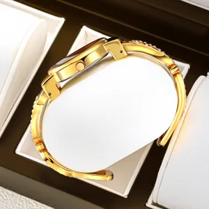Elegant gold women's bangle watch with sparkling rhinestones, luxury style bracelet timepiece.