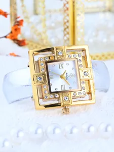 Yalalusi luxury square diamond women quartz watch with white bracelet strap detail.