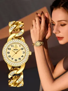 Luxury gold diamond chain women watch with sparkling bezel and elegant dial for daily wear.