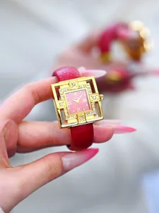 Elegant women's square quartz watch with red leather strap, diamond bezel and pink dial.