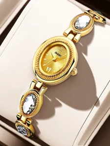 Luxury gold oval dial quartz watch with crystal crystal-inlaid bracelet detail.
