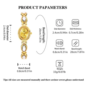 Gold women quartz watch with crystal decor, oval dial, metal chain band and clear size specs.