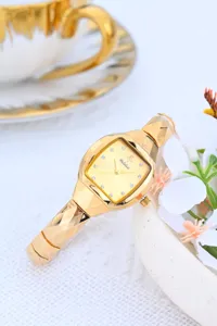 Gold tonneau shaped women quartz watch with rhinestones dial elegant vintage timepiece