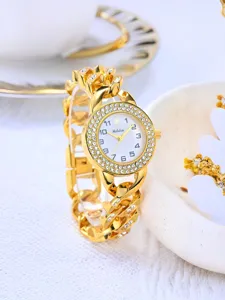 Elegant gold rhinestone chain watch for women, luxury designer quartz wristwatch with dazzling diamonds.