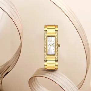 Elegante reloj de pulsera de cuarzo dorado para mujer con bisel de estrás y esfera.