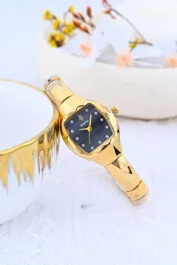 Yalalusi luxury vintage gold women's watch featuring a square dial and faceted bracelet.