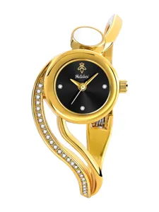 Gold bangle watch detail showing the elegant black dial and sparkling rhinestones.