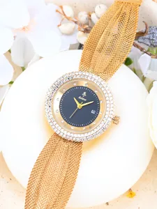 Exquisite luxury women rhinestone bezel watch featuring elegant gold mesh strap for chic style.
