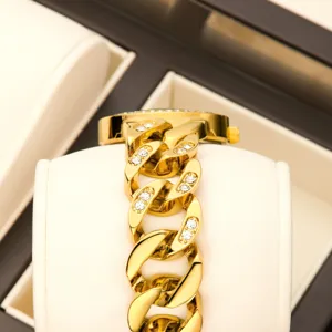 Luxury women gold chain rhinestone watch, elegant chunky bracelet quartz timepiece for ladies.