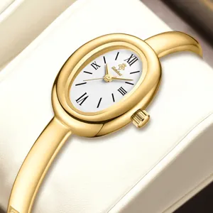 Luxury gold oval bangle watch for women, minimalist quartz wrist watch with white dial.