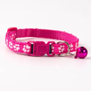 Pink cat collar with cute white paw prints, quick release buckle, and a lovely bell.