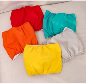 Close up of waterproof pet physiological pants and puppy belly protection shorts in colors.