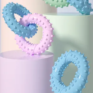 Close-up detail view of colorful TPR dog chew molar ring toy featuring textured surface.