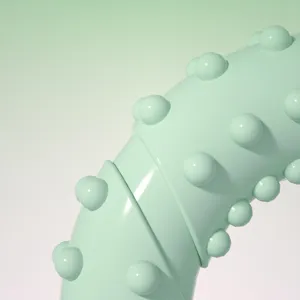 Green TPR pet chew toy detail shot, textured teething design for dogs. Ideal for daily play.
