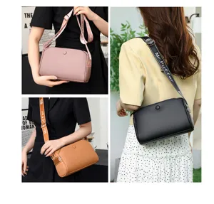 Casual women crossbody bag detail view showing wide strap and leather texture in multiple colors.