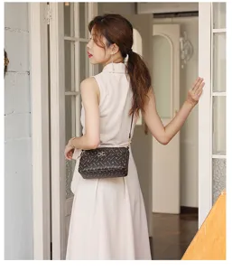 Women retro crossbody bag with monogram print and metal lock clasp, stylish daily purse.