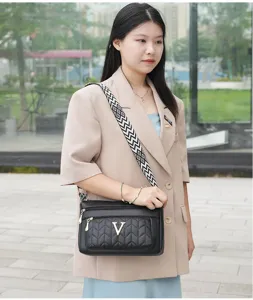 Multi-layer zipper shoulder bag for women, large capacity crossbody bag, soft leather style.