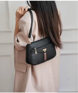 Black soft PU leather shoulder bag for women, featuring metal hardware and daily casual design.