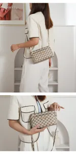 Detailed view of the multi-layer women crossbody bag, showing geometric print and metal hardware.