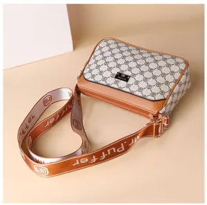 Stylish casual women crossbody bag with wide strap, multi-compartment design for daily use.
