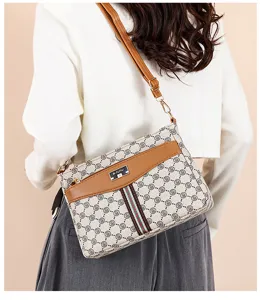Stylish women monogram crossbody shoulder bag with stripe detail, perfect for daily wear.