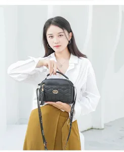 Fashion black quilted crossbody bag for women, chic single shoulder handbag with metal logo.