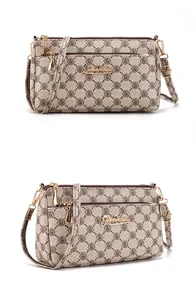 Multi-layer crossbody bag for women with vintage floral pattern, adjustable strap and gold hardware.