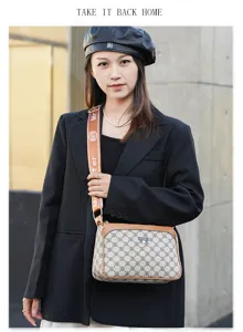 Stylish women monogram crossbody shoulder bag with wide strap and multi-compartment design.