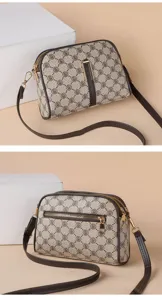 Retro monogram crossbody bag for women, stylish mini dome shoulder bag with zipper.