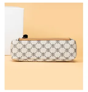 Detailed view of the vintage monogram handbag bottom, showing premium texture and stitching.