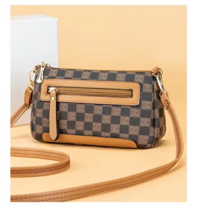 Vintage checkered leather crossbody bag for women, chic shoulder purse with zipper pocket.