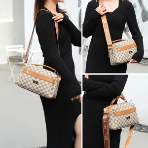 Stylish women's monogram crossbody bag with brown leather trim and multi compartments.