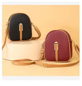 Small crossbody phone bag for women, stylish vertical PU leather shoulder bag casual style.